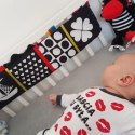 Książeczka sensoryczna - osłona łóżeczka